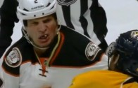 Anaheim Ducks defenceman Kevin Bieksa loses a tooth during fight