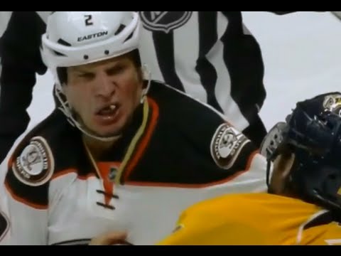 Anaheim Ducks defenceman Kevin Bieksa loses a tooth during fight