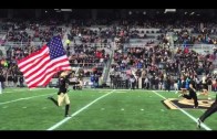 Army football takes the field carrying the French flag