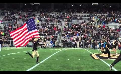 Army football takes the field carrying the French flag