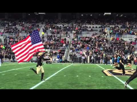 Army football takes the field carrying the French flag