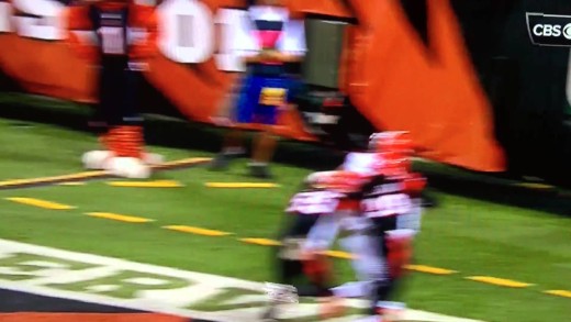 Bengals LB Vontaze Burfict shoves over a TV camera