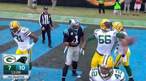 Julius Peppers plays keep away with Cam Newton's touchdown ball