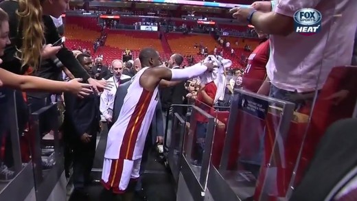 Dwyane Wade rubs used towel in kid’s face