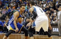Steph Curry hits a 3-pointer even with Andre Miller getting a hand on it
