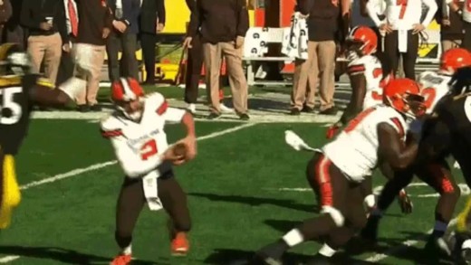 Johnny Manziel has head nearly twisted off by a vicious facemask