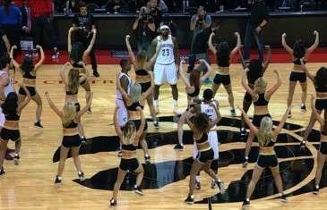 LeBron James and the Cavs surrounded by Toronto Raptors dancers