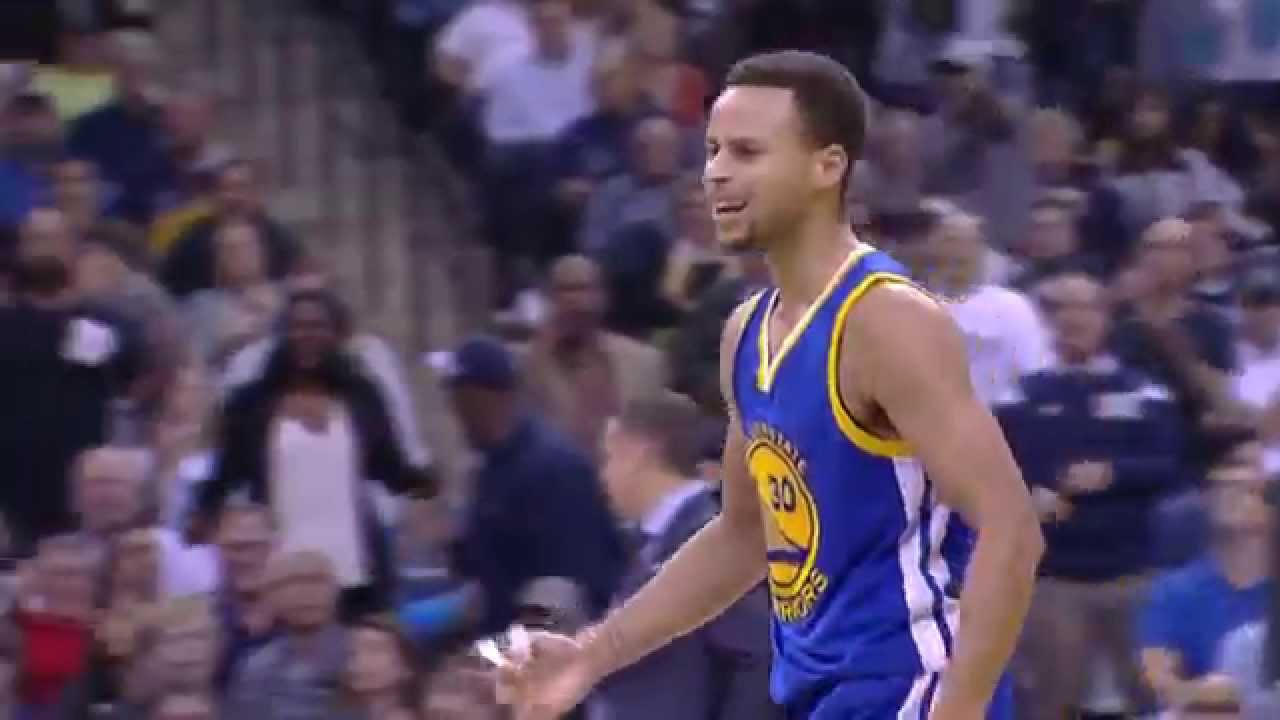 Steph Curry banks in a 3-pointer while bumped with no call