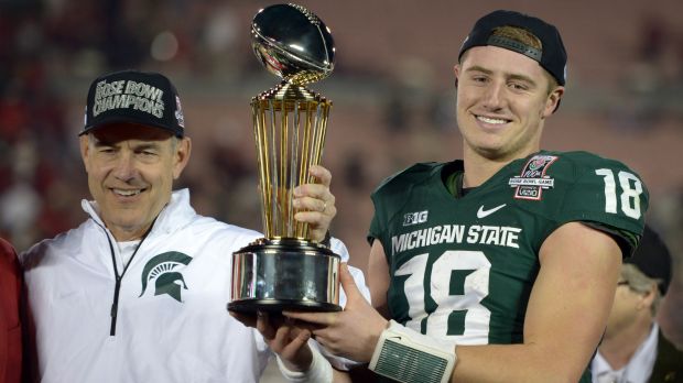 Connor Cook rips MVP trophy from Archie Griffin & apologizes for it once he realized