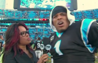 Cam Newton with a funny reaction after being slapped in the butt