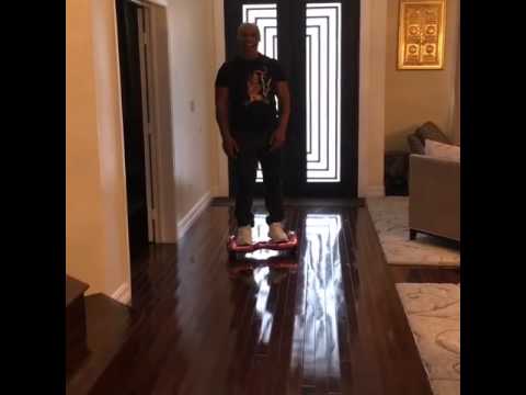 Mike Tyson takes a hard spill on his hoverboard
