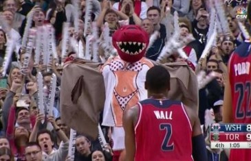 Toronto Raptors mascot does his best to distract John Wall