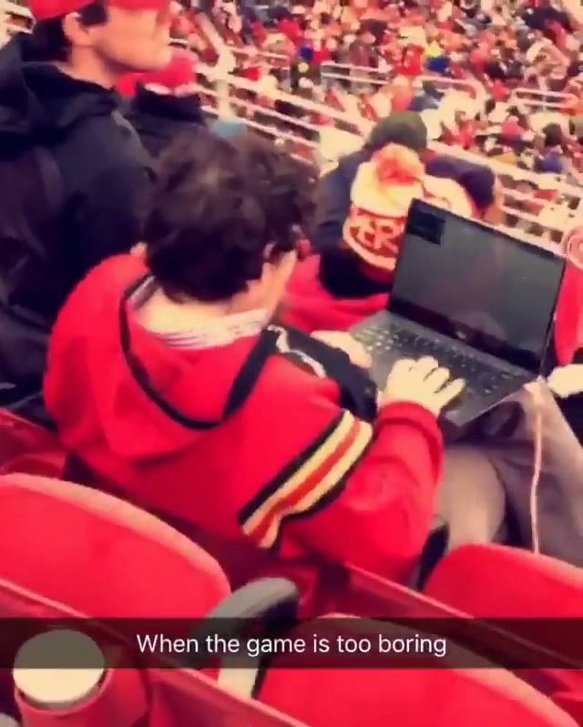 San Francisco 49ers fan pulls out his laptop instead of watching the game