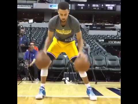 Steph Curry shows off his handles with two balls