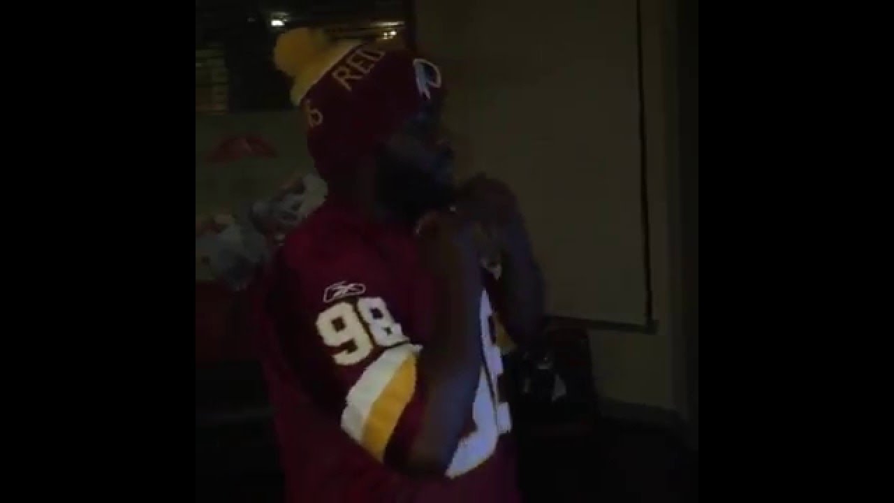 Washington Redskins fan rips his jersey after the Dallas Cowboys win