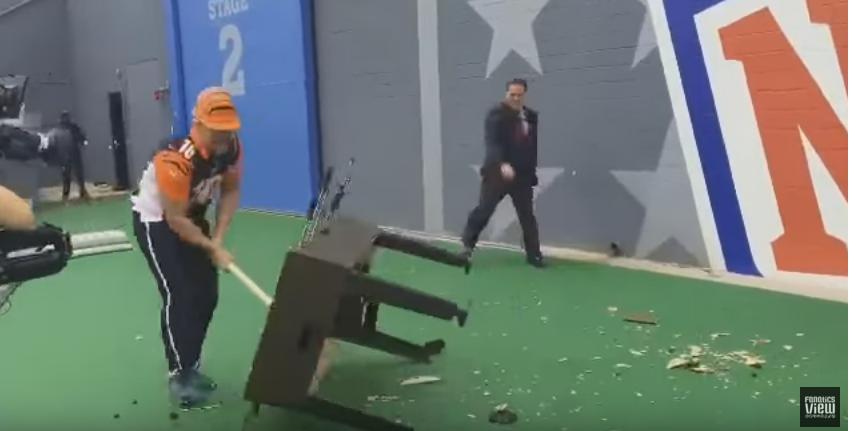 Bengals fan smashes foosball table to try and lift 