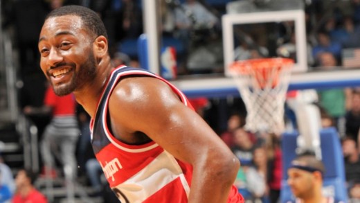 John Wall jumps over Bulls TV analyst Stacey King