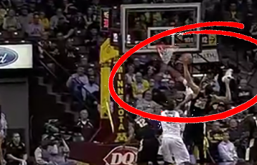 Purdue’s A.J. Hammons grabs a rebound with his shoe in one hand