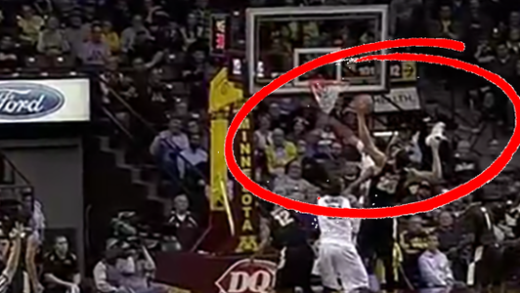 Purdue’s A.J. Hammons grabs a rebound with his shoe in one hand