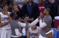 Lance Stephenson & Josh Smith slap box each other on the Clippers bench