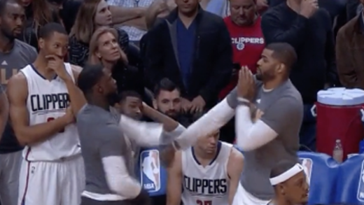 Lance Stephenson & Josh Smith slap box each other on the Clippers bench