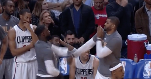 Lance Stephenson & Josh Smith slap box each other on the Clippers bench