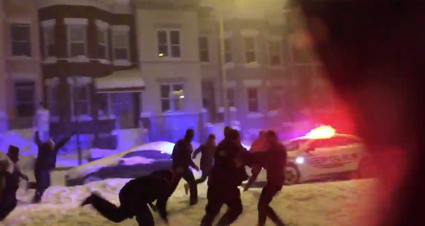 Washington D.C. cop with a beast football stiff arm in the snow storm