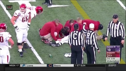 Arkansas’ Dominique Reed carted off after head to head collision