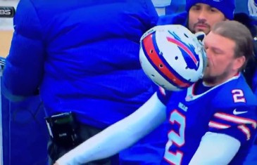 Bills kicker Dan Carpenter hits himself in the face with his own helmet