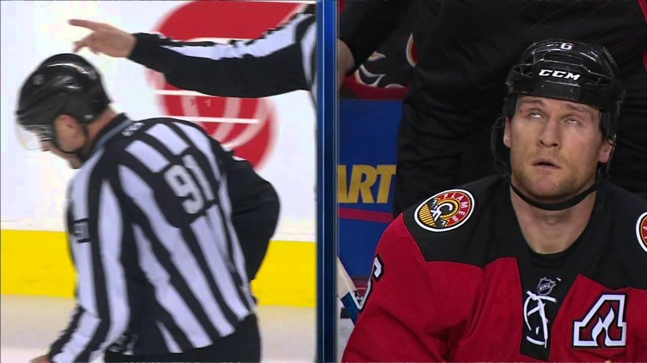 Calgary Flames defenceman levels a referee