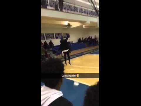 Cam Newton air balls a 3-pointer at a high school