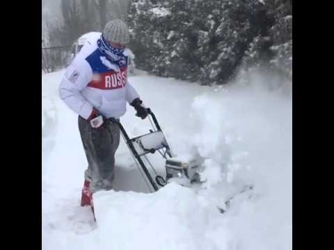 Capitals' Alex Ovechkin fights back the storm with his snow blower