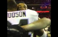 Charles Woodson throws up the “O” causing section of Raiders fans to do the same