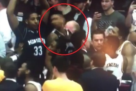 Iona player cracks a Monmouth player in the face