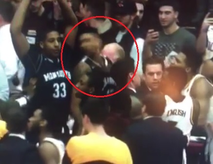Iona player cracks a Monmouth player in the face