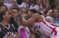 Kyle Lowry kisses a fan after collision