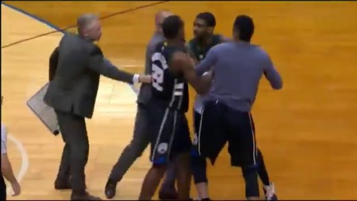 OJ Mayo has to be restrained by Bucks coaching staff after ejection