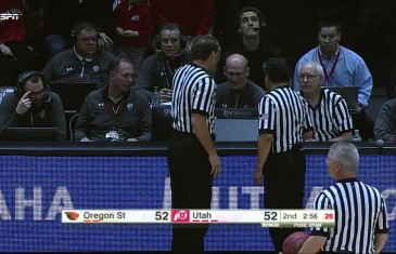 Oregon State player Jarmal Reid trips a referee
