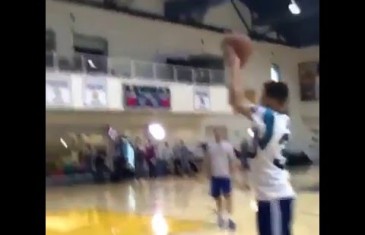 Steph Curry hits jumpers in his Carolina Panthers jersey