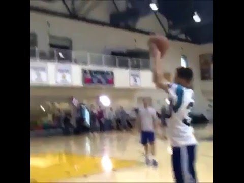 Steph Curry hits jumpers in his Carolina Panthers jersey