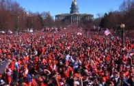 Broncos fans flood the streets of Denver for SB50 parade