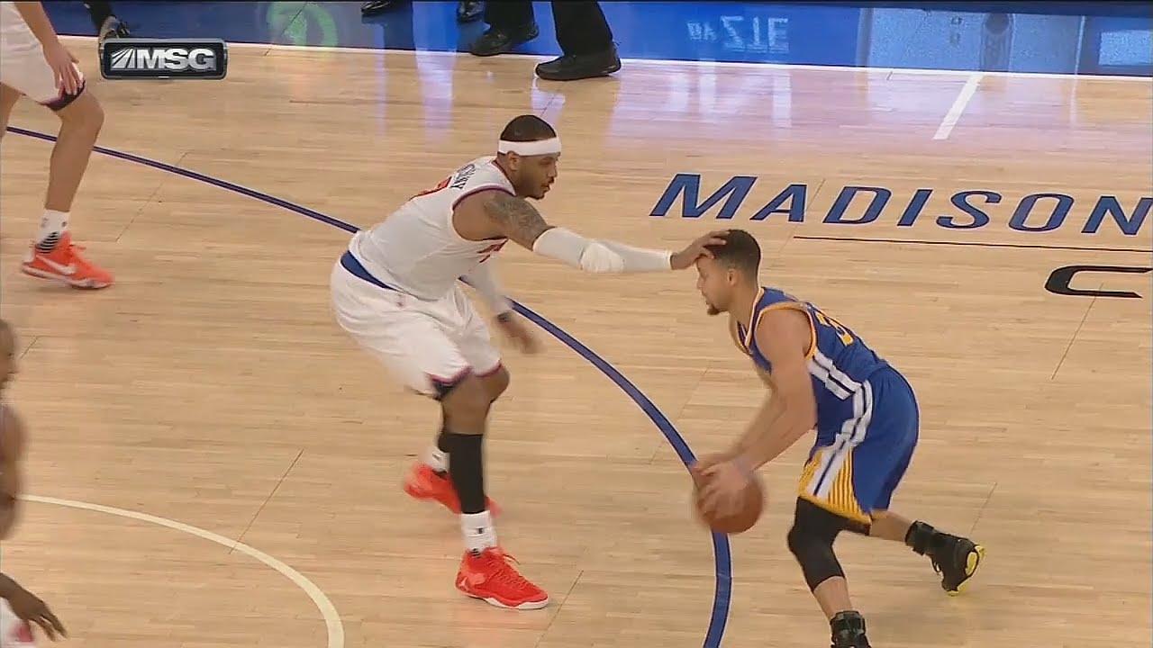 Carmelo Anthony defends Steph Curry by putting his hand on his head