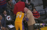 Kobe Bryant gets his finger popped back into place