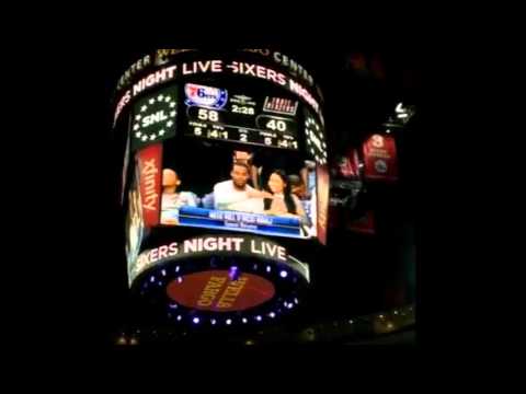 Meek Mill dabs with Nicki Minaj at the Philadelphia 76ers game