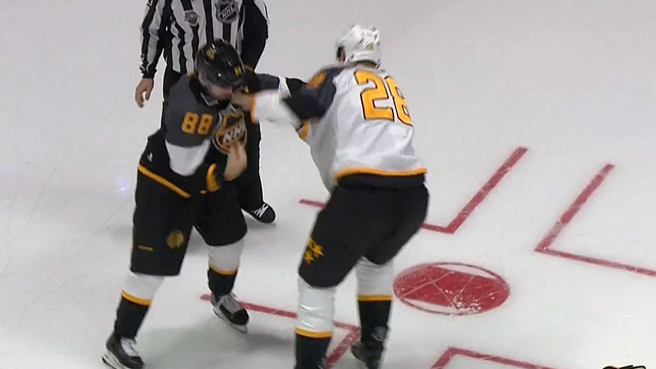 Patrick Kane & John Scott have a fake fight during the NHL All Star game