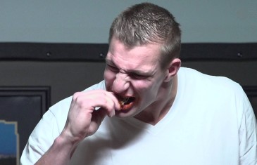 Rob Gronkowski attempts to take down spicy chicken wing challenge
