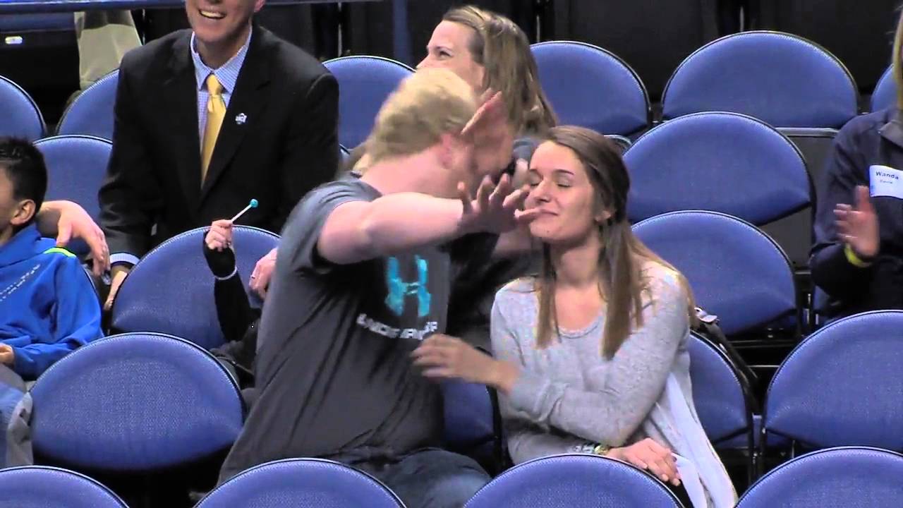 Savage: Basketball fan pump fakes a hug with his girlfriend