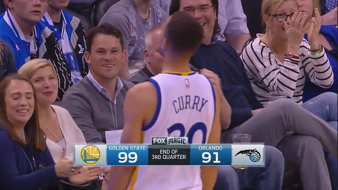 Stephen Curry hits the half court 3-pointer at the buzzer