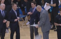 Xaiver head coach Chris Mack punches his clipboard into two pieces