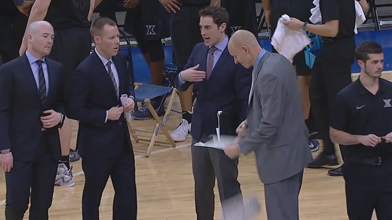 Xaiver head coach Chris Mack punches his clipboard into two pieces